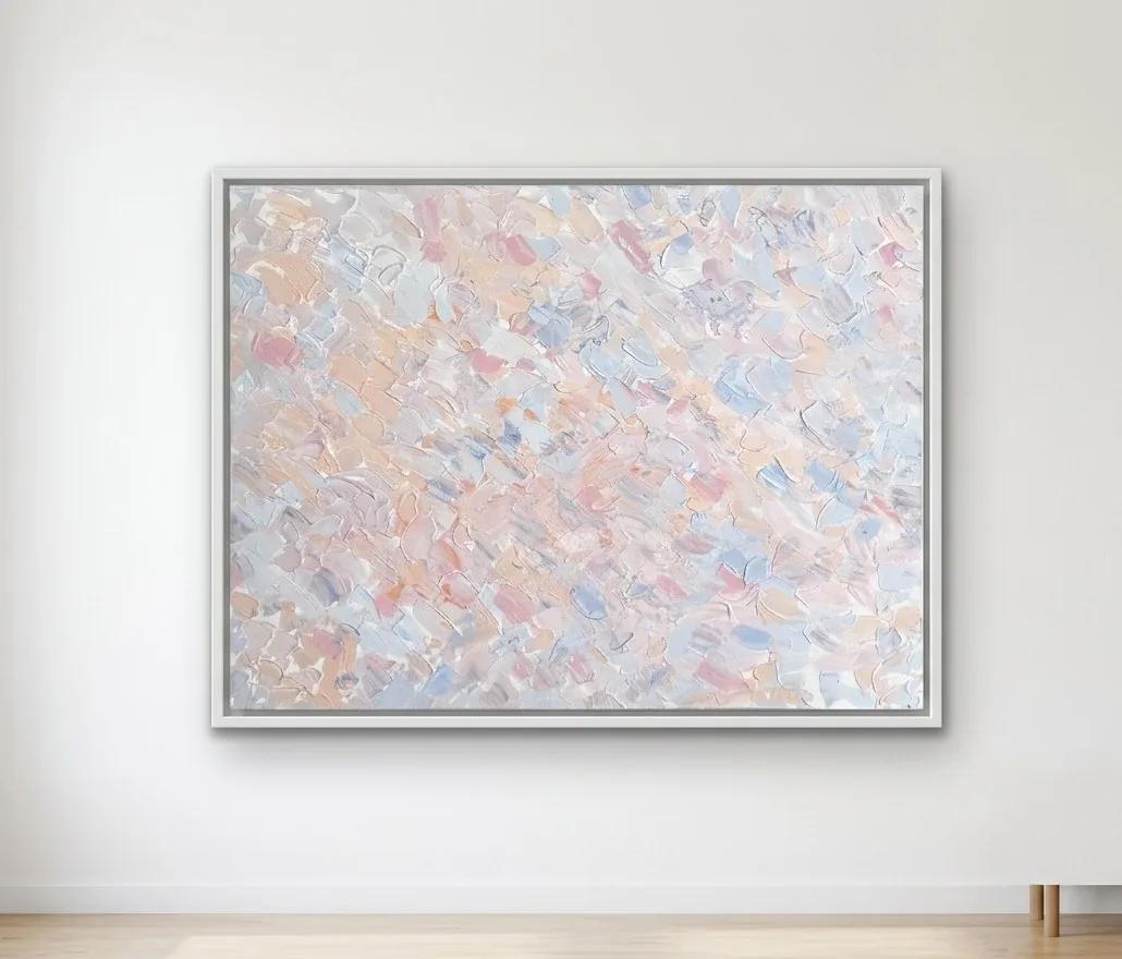 Nuances N1, a pastel pink, peach and blue impasto painting in a white frame